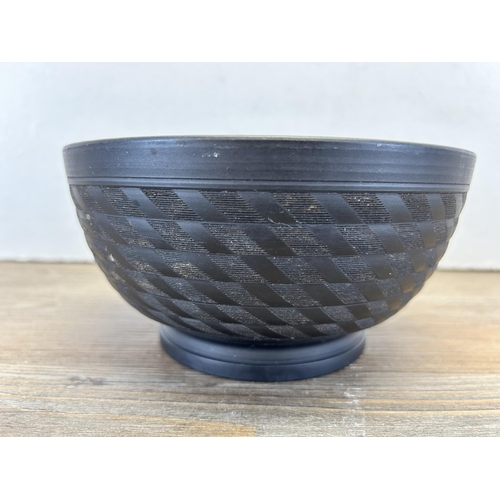 207 - A Wedgwood black basalt footed bowl - approx. 8.5cm high x 17cm diameter