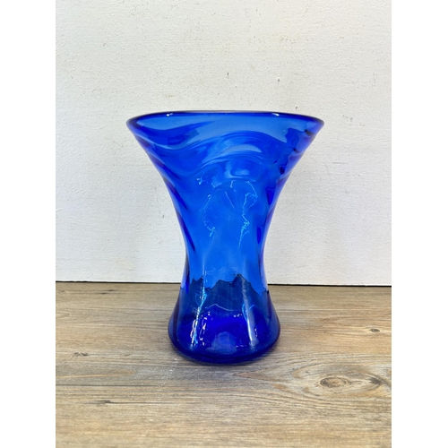 208 - Three pieces of studio glass to include Thomas Webb blue 23cm trumpet vase etc.