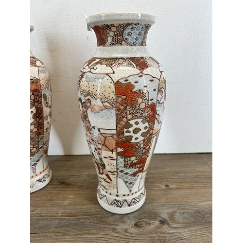 211 - A pair of Japanese Satsuma baluster vases - approx. 33cm high