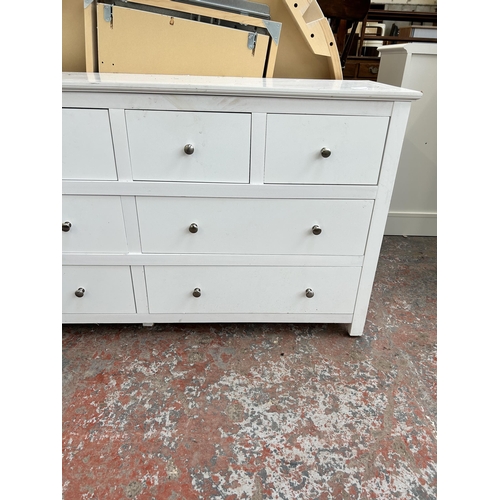 138 - A modern white painted chest of four short over four long drawers