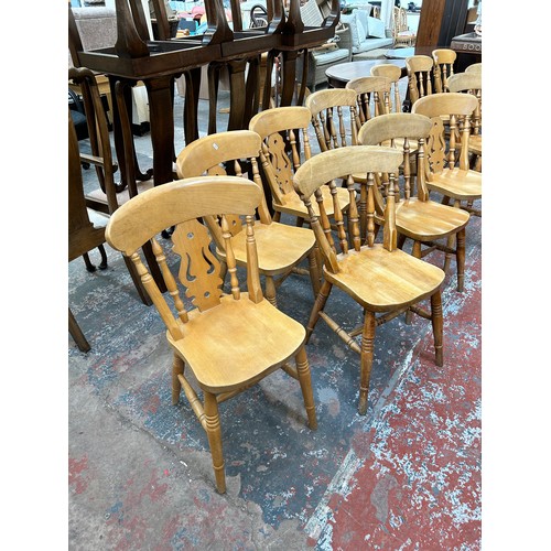 131 - Fourteen Victorian style beech farmhouse dining chairs