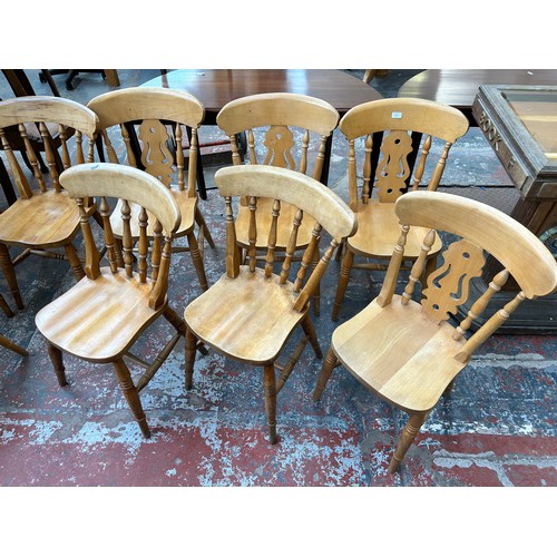 131 - Fourteen Victorian style beech farmhouse dining chairs