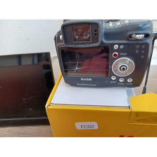 629A - A collection of items to include Fujifilm Instax mini 9 instant camera, Canon Epoca Caption 35mm cam... 