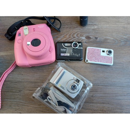 629A - A collection of items to include Fujifilm Instax mini 9 instant camera, Canon Epoca Caption 35mm cam... 