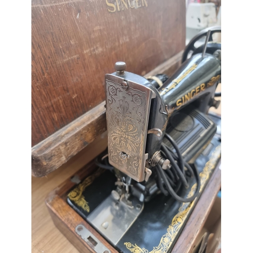 770 - A cased 1923 Singer 99K electric sewing machine with foot pedal and light