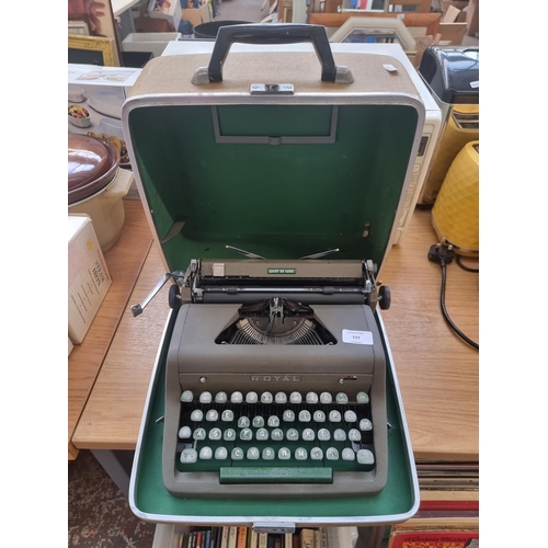 777 - A cased vintage Royal Quiet De Luxe portable type writer