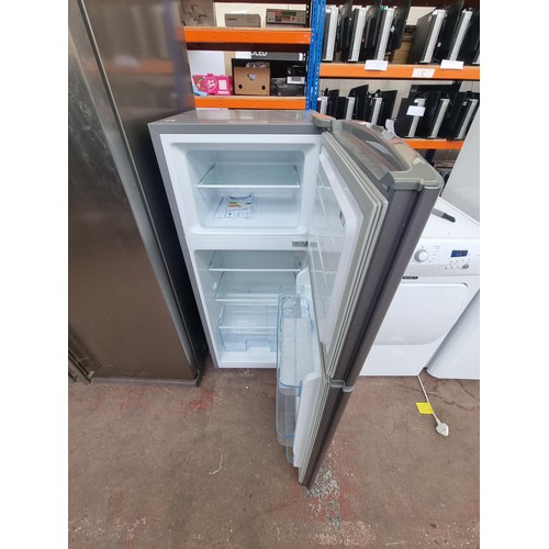 797 - A Fridgemaster MTM48120S upright fridge freezer with instruction manual - approx. 119cm high