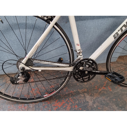 803 - A B-Twin Triban 3 road bike with micro swift 16-speed gear system