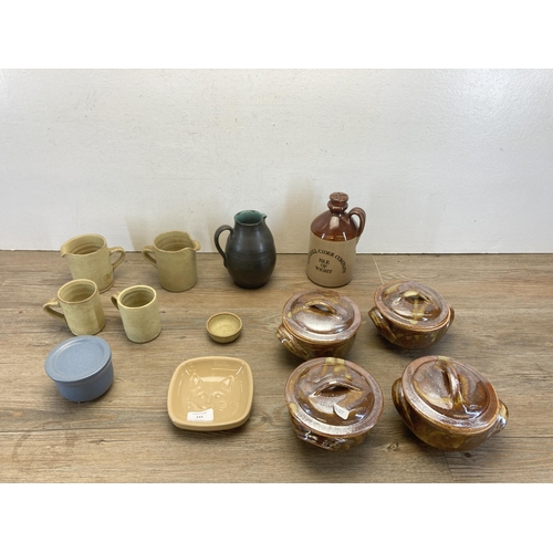 233 - A collection of studio pottery to include Lake's Cornish Pottery Truro jug, Mason Cash cat dish, fou... 