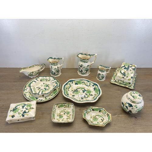 235 - A collection of Mason's Chartreuse ironstone pottery to include three graduating jugs, ginger jar an... 