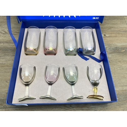 240 - A mid 20th century cased OMO eight piece advertising drinking glass set