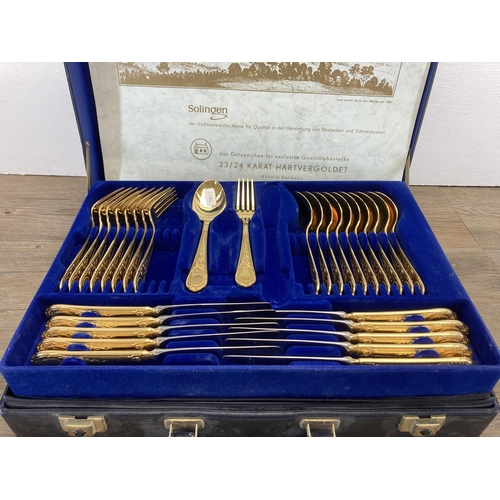 262 - A Solingen 23/24 Karat plated canteen of cutlery