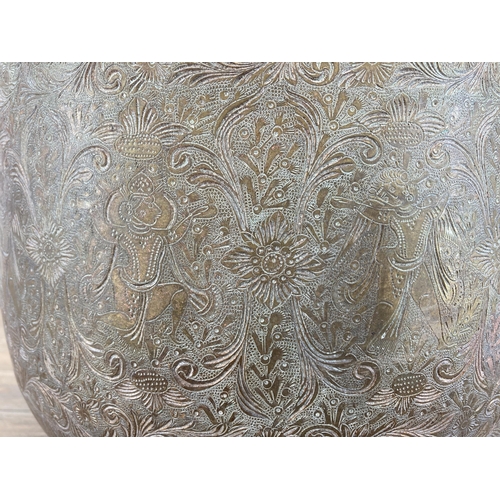 266 - A vintage Middle Eastern etched brass jardinière - approx. 23cm high x 28cm diameter