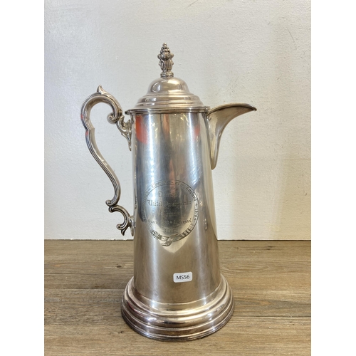 268 - Three 19th century ecclesiastical communion silver plated water jugs to include Walker & Hall etc. -... 