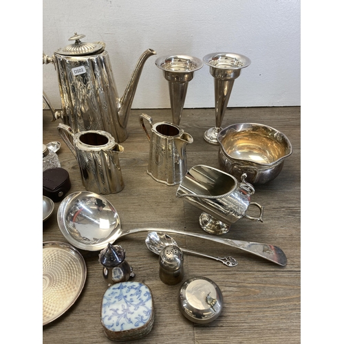 275 - A large collection of silver plated ware to include Victorian coffee pot, Walker & Hall milk jug and... 