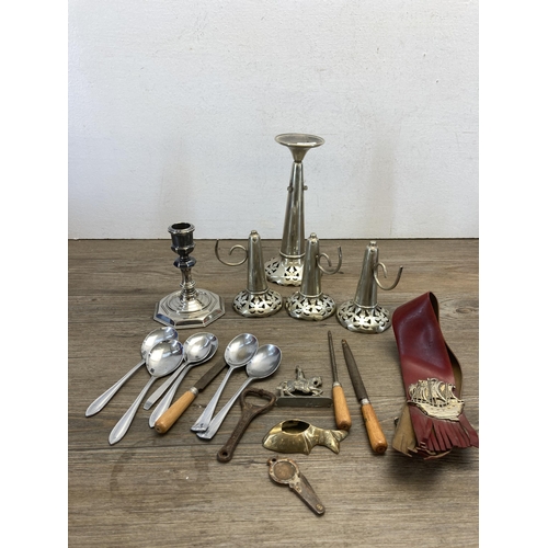 279 - A collection of metalware to include Indian brass cobra snake candlestick, cased Mappin & Webb five ... 