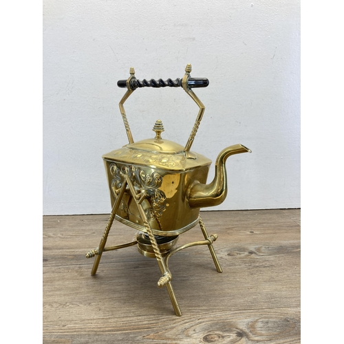 292 - An Arts and Crafts brass spirit kettle and stand - approx. 36cm high including stand