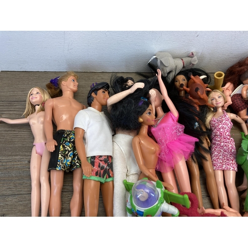 327 - A collection of soft toys and plastic dolls