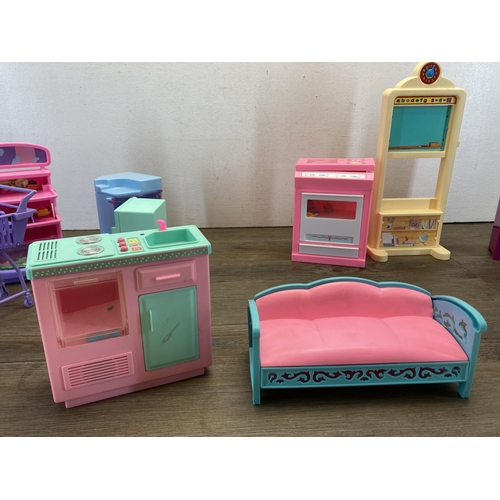 332 - A collection of Barbie doll furniture and accessories together with a Sindy fridge