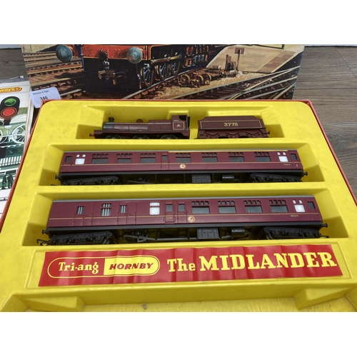 346 - A collection of model railway catalogues and booklets together with a boxed Hornby 'The Midlander' e... 