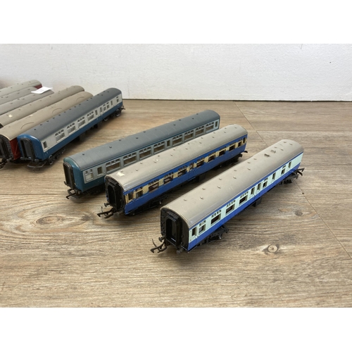 347 - Fifteen 'OO' gauge model railway carriages to include Hornby, Bachmann etc.