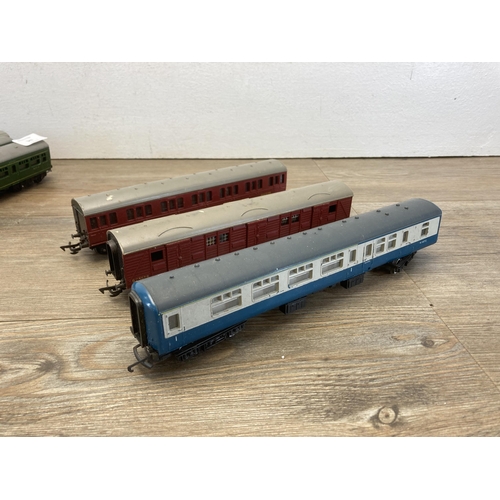 347 - Fifteen 'OO' gauge model railway carriages to include Hornby, Bachmann etc.