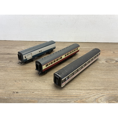 347 - Fifteen 'OO' gauge model railway carriages to include Hornby, Bachmann etc.