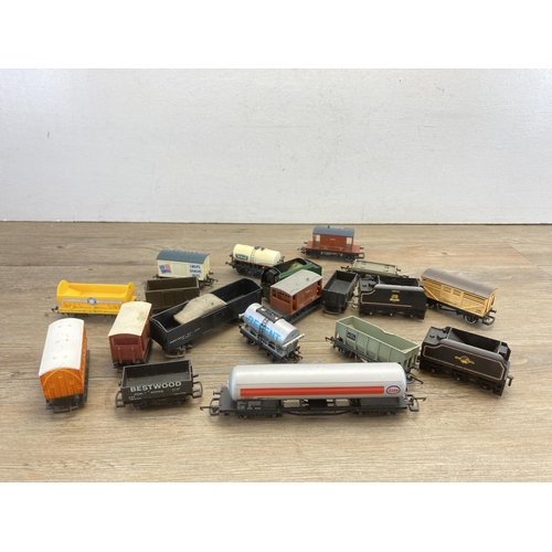 348 - A collection of Hornby OO gauge model railway accessories to include boxed R296 track cleaning coach... 