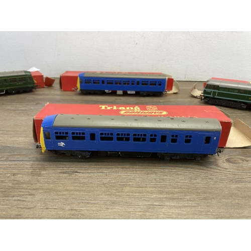 349 - Four boxed Tri-ang 'OO' gauge coaches and locomotives