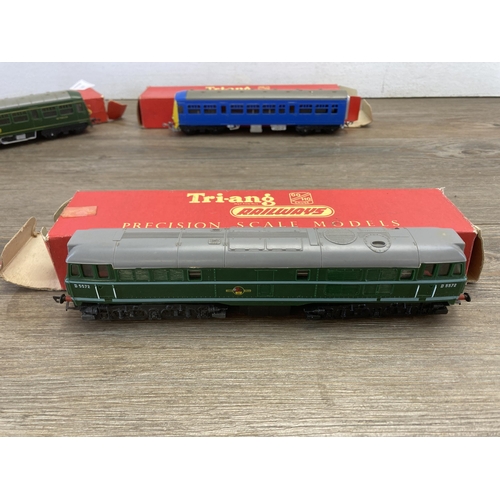 349 - Four boxed Tri-ang 'OO' gauge coaches and locomotives