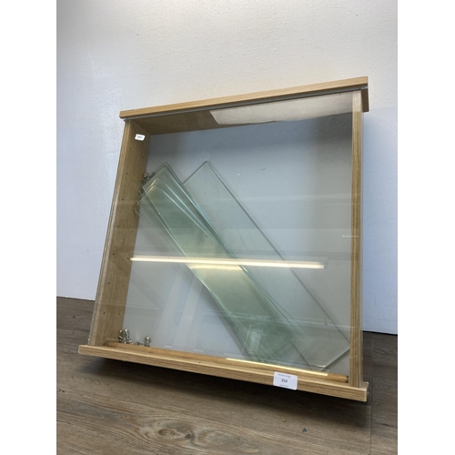 354 - A modern oak effect wall mountable display case - approx. 55cm high x 55cm wide x 10cm deep