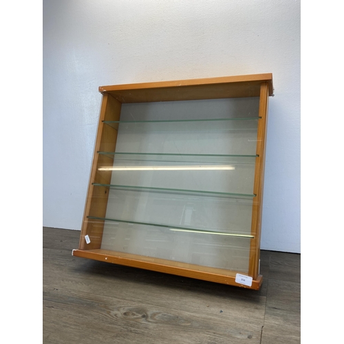 356 - A modern pine wall mountable display case - approx. 55cm high x 55cm wide x 11cm deep