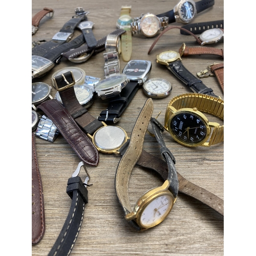 403 - A large collection of wristwatches to include Adec quartz alarm chronograph, Swatch quartz, Accurist... 