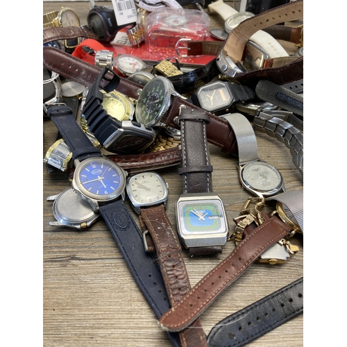 405 - A large collection of wristwatches to include Timex, Zona, Casio etc.