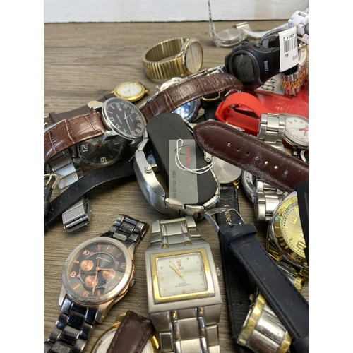 405 - A large collection of wristwatches to include Timex, Zona, Casio etc.