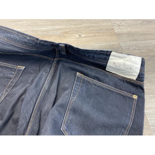 407 - Two pairs of men's size 34 denim jeans, one pair of Dolce & Gabbana and one pair of Paul Smith