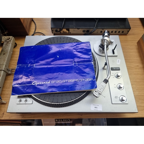 661 - A Garrard GT-35P two-speed turntable fitted with Shure M75ED cartridge with instruction manual