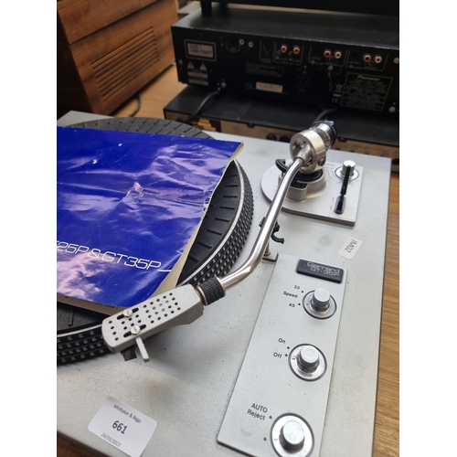 661 - A Garrard GT-35P two-speed turntable fitted with Shure M75ED cartridge with instruction manual