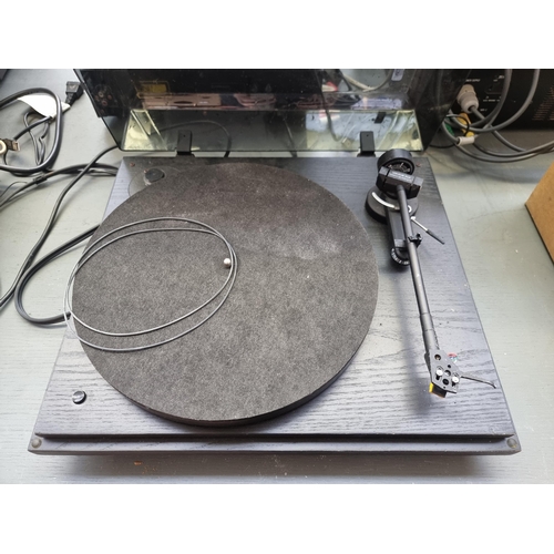 664 - A Revolver turntable fitted with Linn Basik Plus tonearm