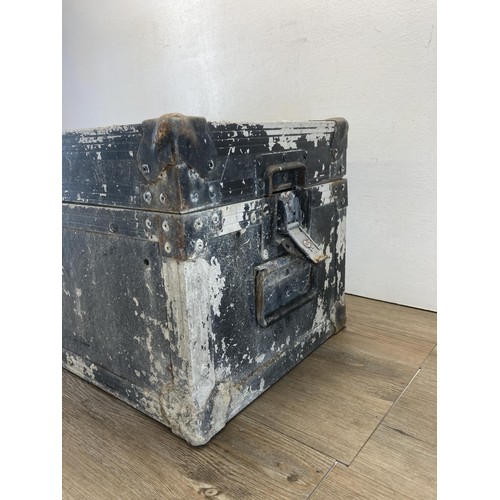 541 - A vintage metal travel trunk