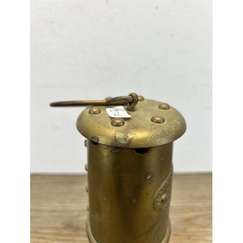 498 - A Hockley Lamp & Limelight Company brass miners lamp - approx. 23cm high