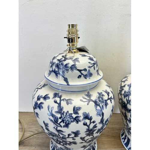 503 - A pair of India Jane blue and white ceramic table lamps - approx. 42cm high