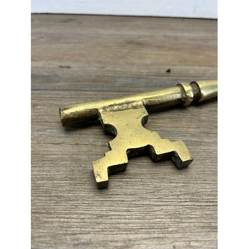 522 - A 19th century style oversized brass key - approx. 35cm long