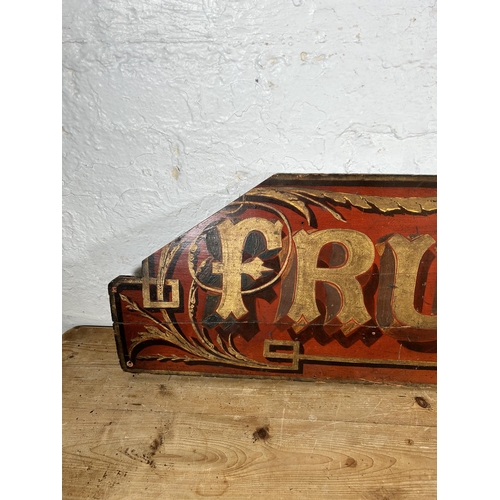 526 - A vintage hand painted wooden 