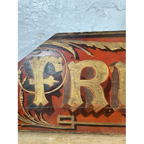 526 - A vintage hand painted wooden 