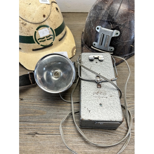 534 - Two 1960s plastic miners safety helmets, one The Cromwell and one Texolex