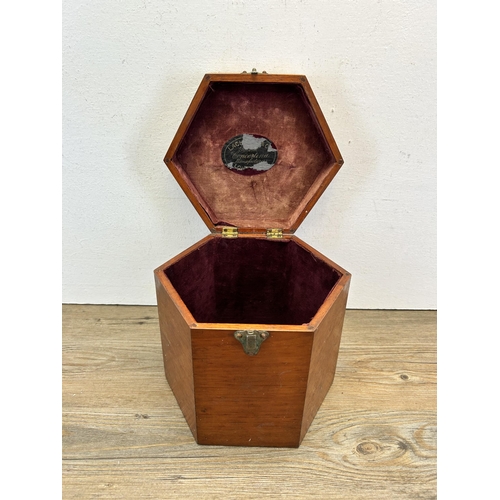 535 - An early 20th century mahogany octagonal box - approx. 18cm high x 21cm wide x 18cm deep