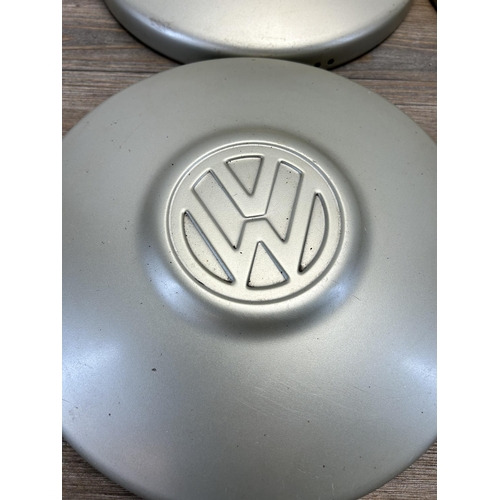 552 - Four Volkswagen hubcaps - approx. 26cm diameter