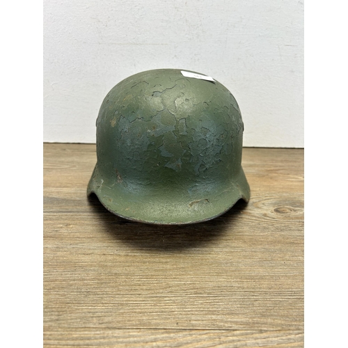 561 - A post WWII German helmet