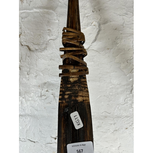 567 - A vintage wood and wicker long bow - approx. 156cm long